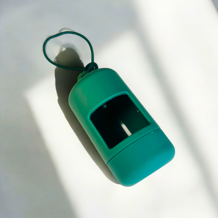 Green dog poo bag dispenser