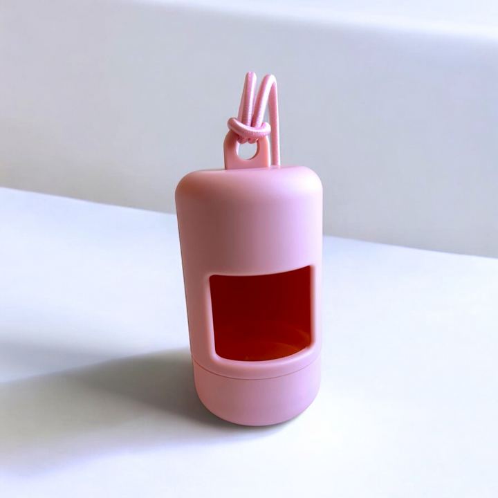 Pink dog poo bag dispenser